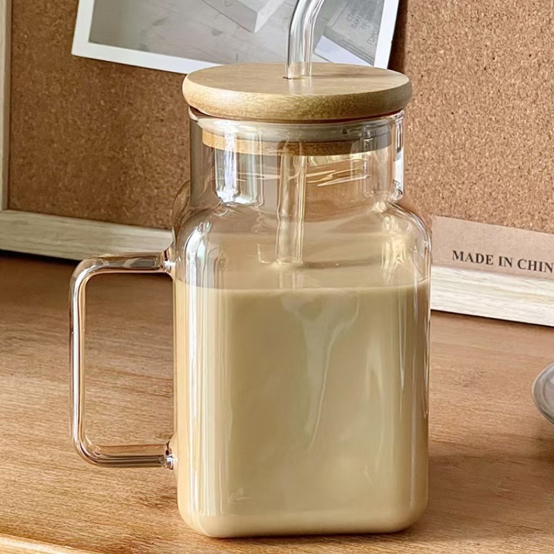 Nuevo producto Taza de paja cuadrada especial Vaso de vidrio con tapa de borosilicato Taza de jugo Gran capacidad y mango de alto valor