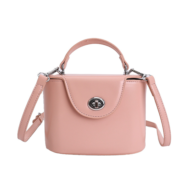 Nicho coreano caja de bloqueo de mano bolso pequeño para mujeres 2026 nueva moda exquisita versátil bolso de hombro
