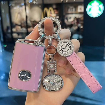 Car key bag Angkesela Car Key Cover - type-c-three-button-purple-key-cover-diamond-ring-car-logo-leather-buckle-diamond-car-logo