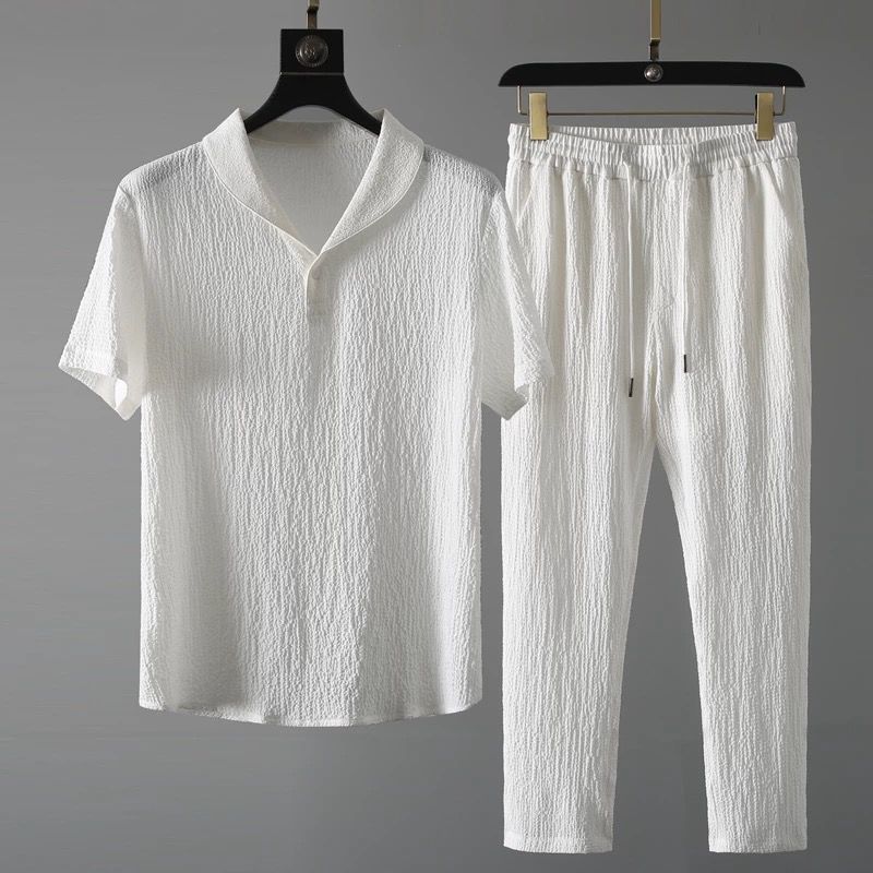 Primavera y verano ligero lujo plegado casual juego deportivo hombre ligero transpirable con solapa de moda pantalones de manga corta dos piezas