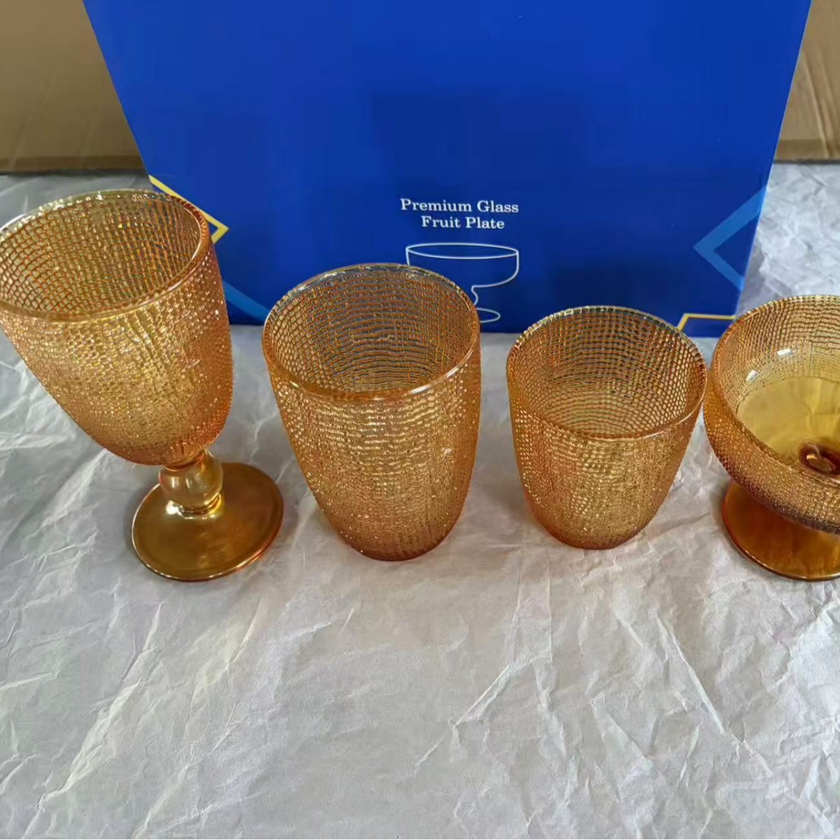 Vaso de vidrio en relieve de alto valor transfronterizo, enjuague bucal especial para hotel, taza de helado, taza de vino tinto, bolsas de tela