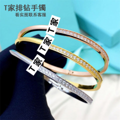 T家の狭い版はドリルの単列のドリルのブレスレットを入れて、カップルの手環のバラの金のファッションの太い版の欧米の腕輪の現物を掛けます。