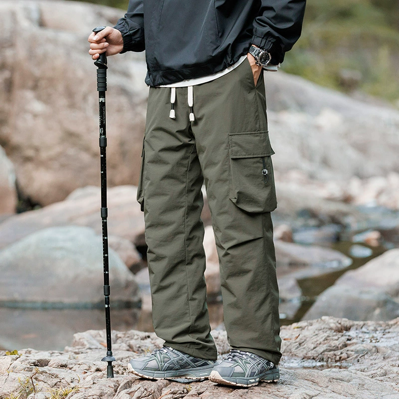 Пуховые штаны для мужчин могут быть открыты через границу