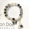 S577 black burst rhinestone butterfly