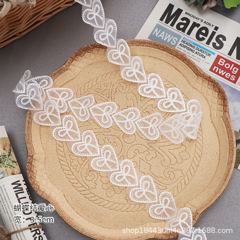 レースの白い桃の心の愛のレースの婦人服の子供服のアクセサリーのdiyの蝶のポリエステルの工芸品のレース