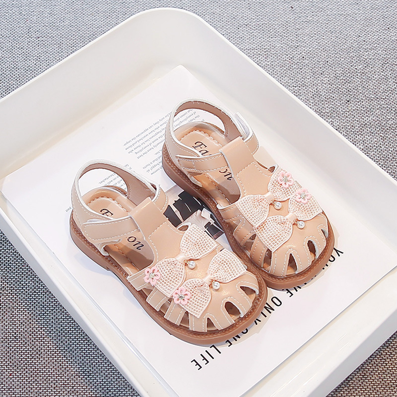 Sandallas de niñas verano 2026 nuevo estilo de moda infantil zapatos casuales versátiles arco sandalias de cabeza de bolsa zapatos princesa image 5