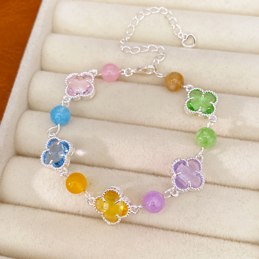 Brazalete de piedra de vidrio de hierba de la suerte ligera de lujo nicho de alta sensación pulsera fresca dulce accesorios de vacaciones joyas de mano