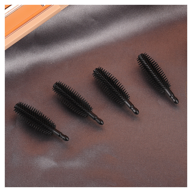The manufacturer supplies disposable olive-shaped eyelash brush…