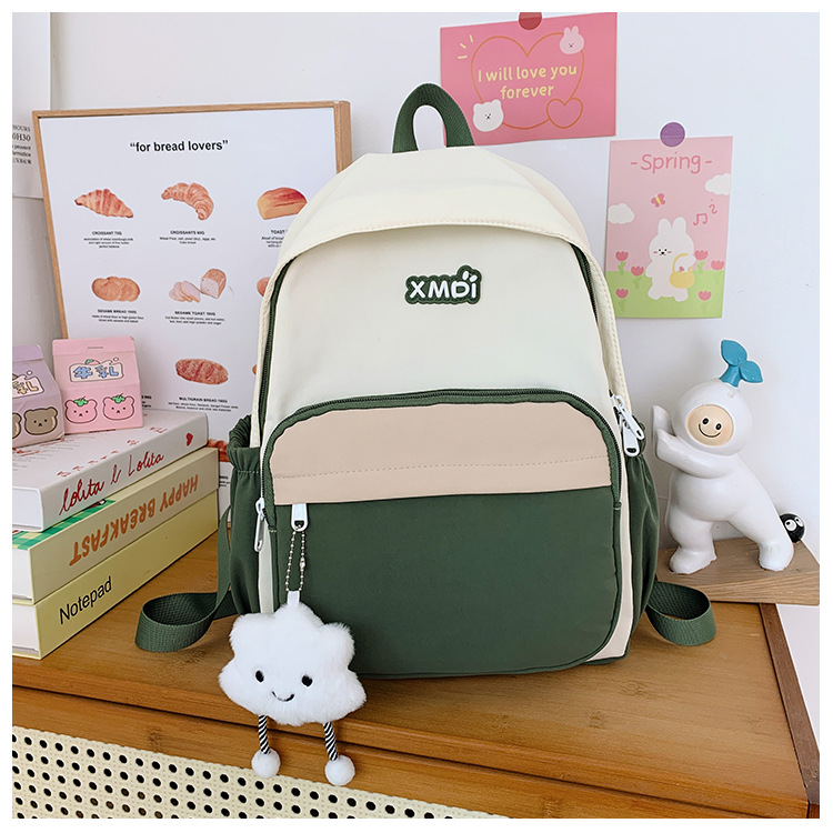 Mochila coreana ins-viento para niños y niñas, mochila casual simple de gran capacidad, mochila de color, mochila infantil, adorable colgante.