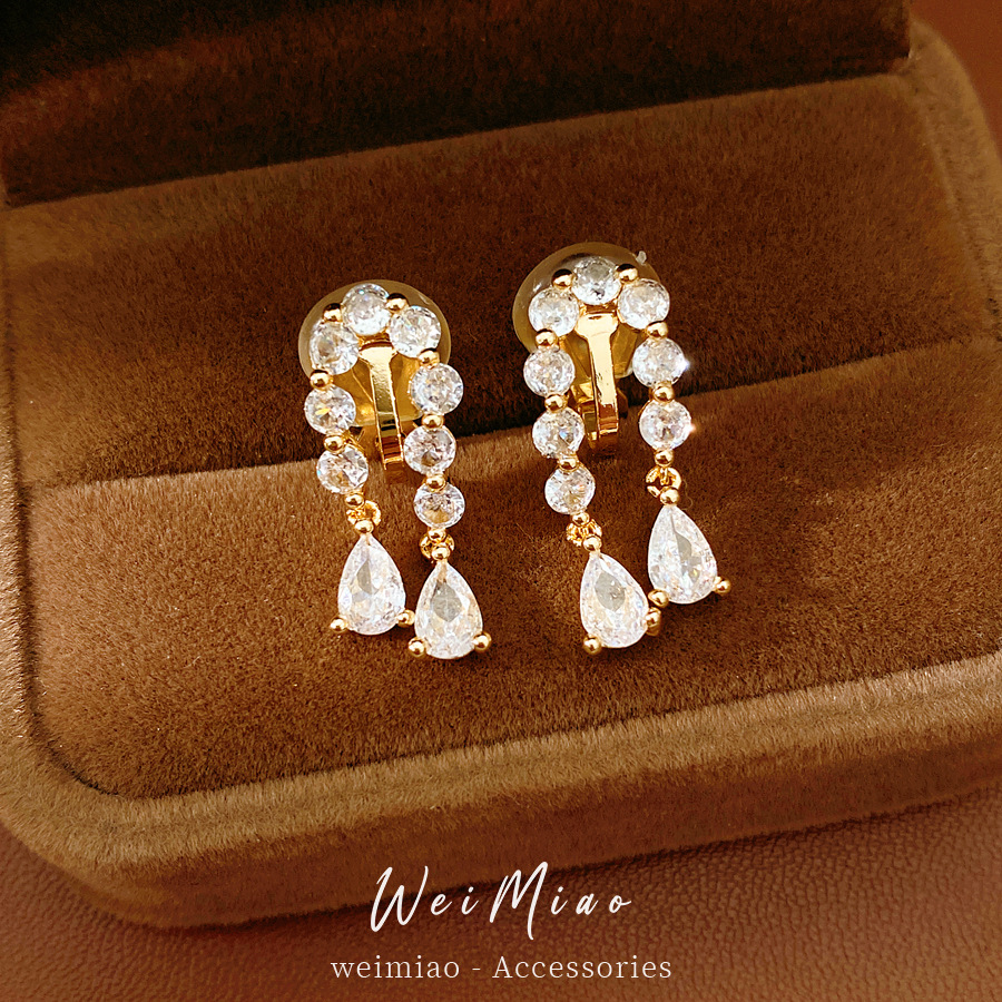 18 quilates de oro real galvanizado galvanizado galvanizado gota de agua orejas clips de orejas mujeres sin agujeros de orejas pendientes ligeros de lujo alta sensación de orejas al por mayor