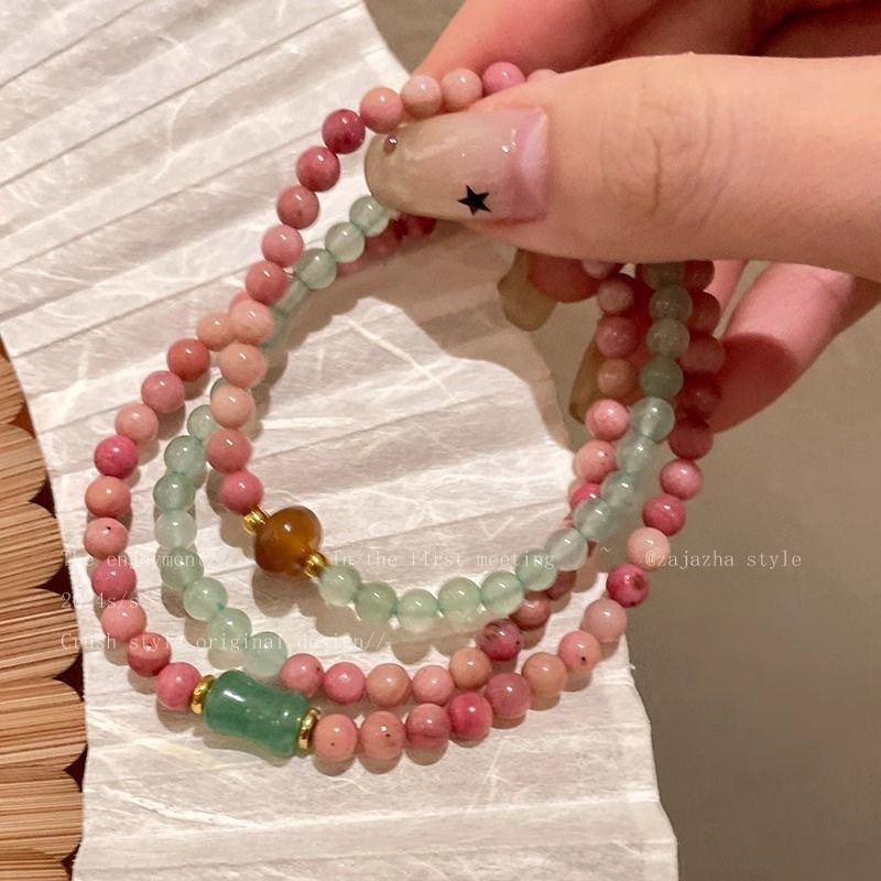 Nuevo estilo chino de pulsera de cuentas de múltiples anillos, estilo de mujer, pulsera de lujo ligera, pulsera de lujo sofisticada, pulsera rosa de nicho de alta calidad.