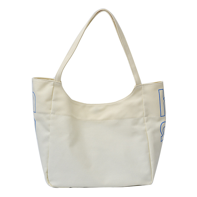 Bolso Tote de moda coreana 2025 verano nuevo estilo bolso femenino casual alfabeto bolso de hombro de lona estilo universitario