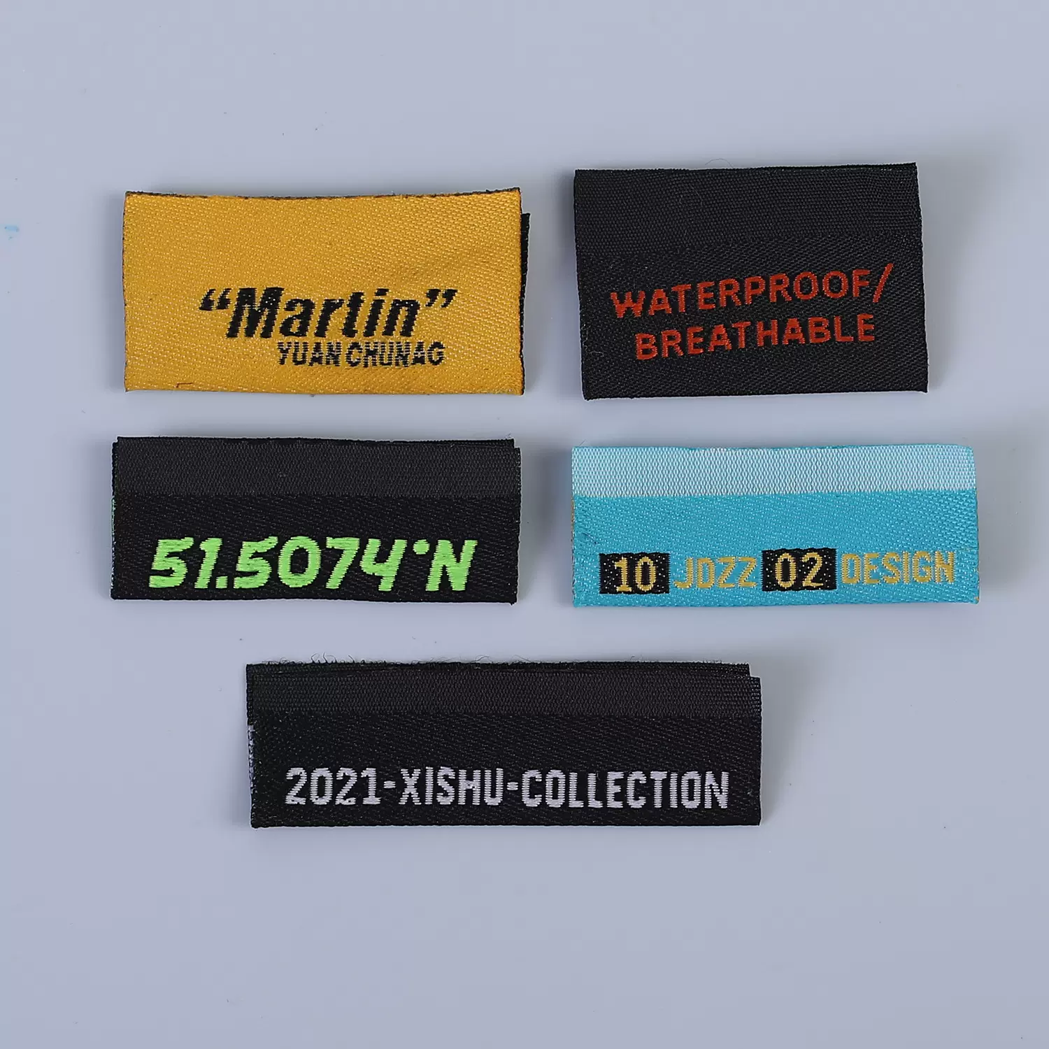 厂家直供织唛现货 服装鞋帽被套家纺水洗唛胸标肩章领标布标商标