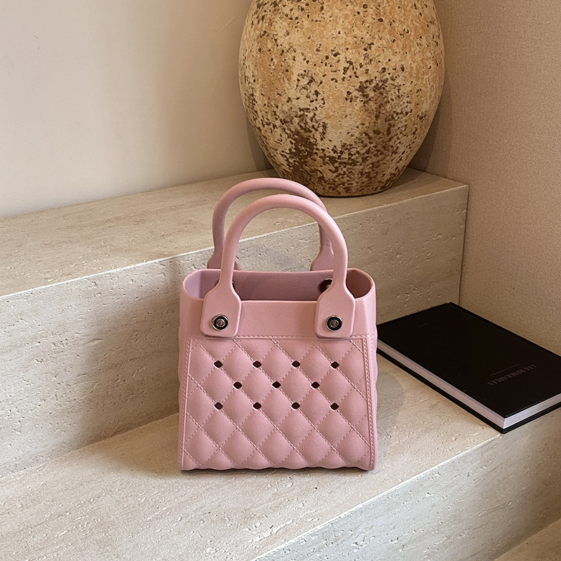 Bolso Tote de moda coreana 2025 verano nuevo estilo bolso femenino agujero hueco bolso de mano moda ringge bolso de playa marea