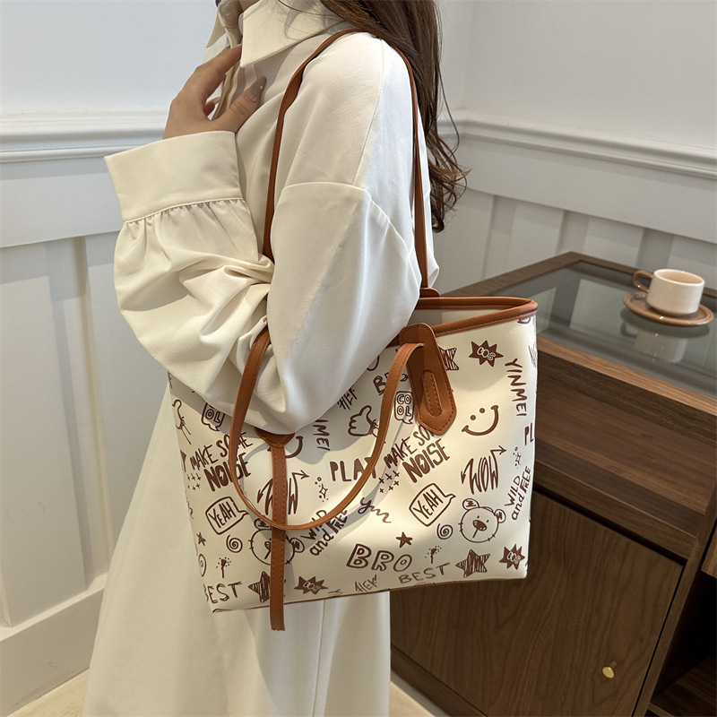 Borsa tote da donna con tracolla singola, di alta qualità, grande, alla moda e di nicchia, 2024, borsa da viaggio di classe graffiti_voghion.com