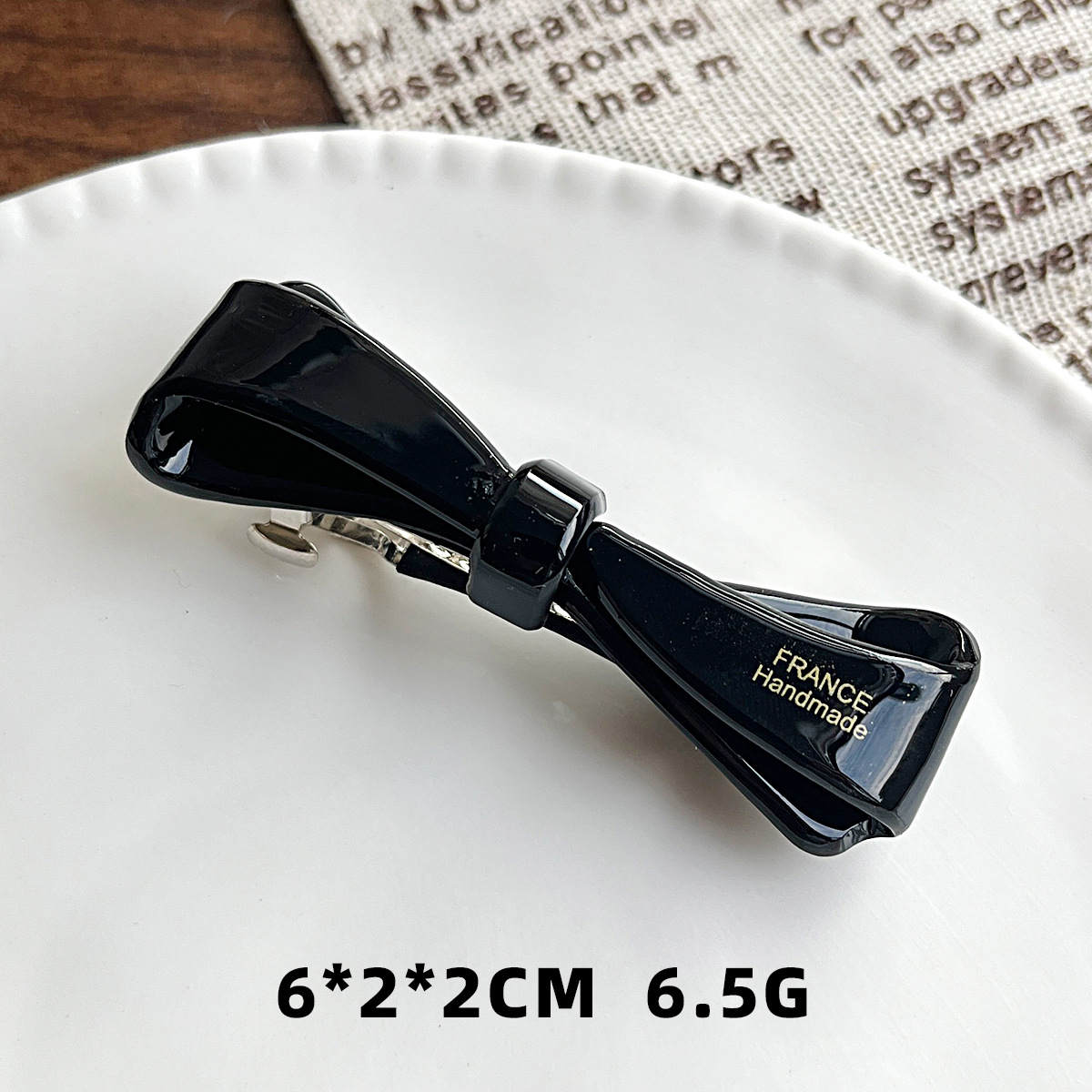 Clip de cabello de arco acético retro francés temperamento suave temperamento temperamento versátil lateral ceja clip de cabello de cabeza posterior