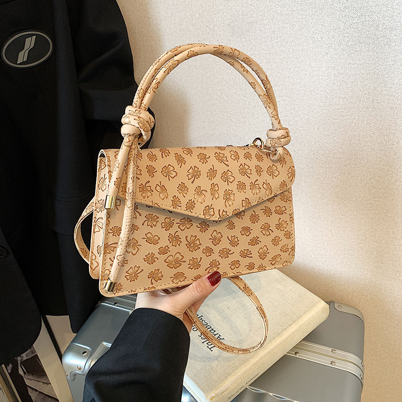 Simple retro tendencia extranjera bolso de mujer 2025 primavera nuevo temperamento casual de hombro mochila pequeña bolsa de mujer