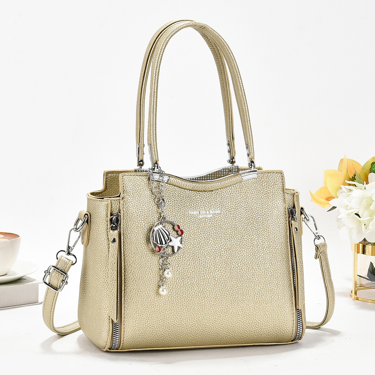 Bolso de madre de mediana edad de gran capacidad para mujer 2025 nuevo bolso atmosférico bolso de mensajero simple bolso de alta gama para mujer