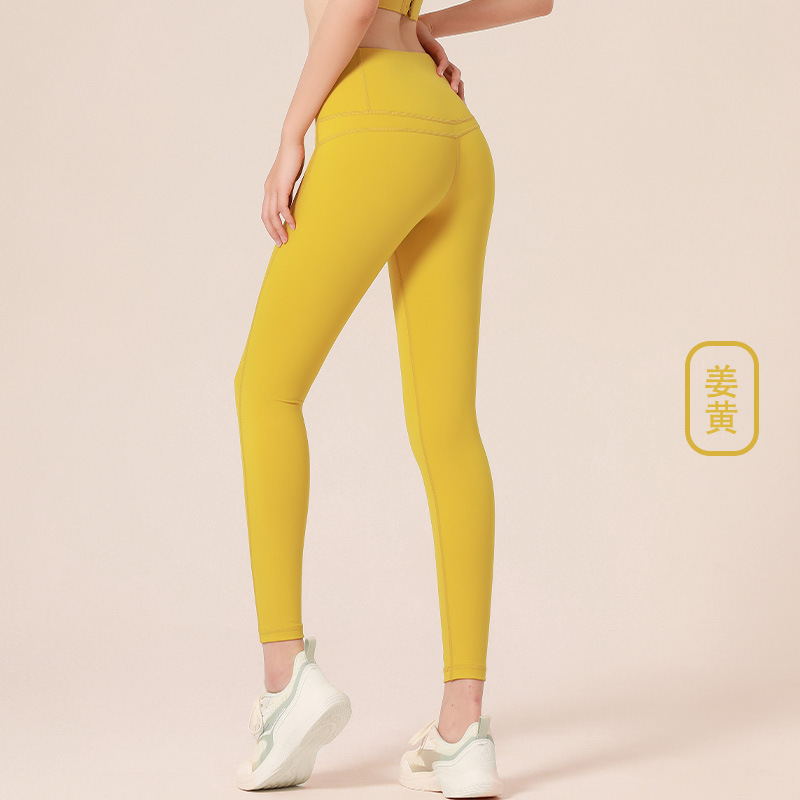 Juyitang europeo y americano desnudo melocotón verano fitness Pantalones mujer apretado cintura alta cadera elevación estiramiento correr deportes yoga Pantalones