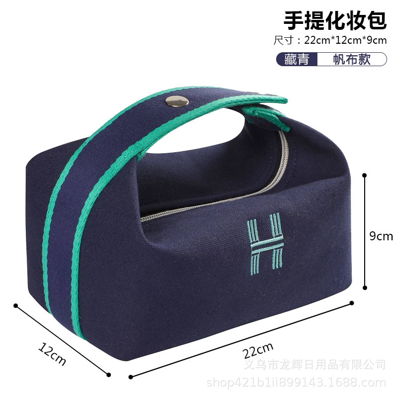 Bolsa de cosméticos de lona impermeable portátil de alta apariencia de gran capacidad de lavado bolsa de cosméticos de red roja portátil bolsa de almacenamiento de color sólido