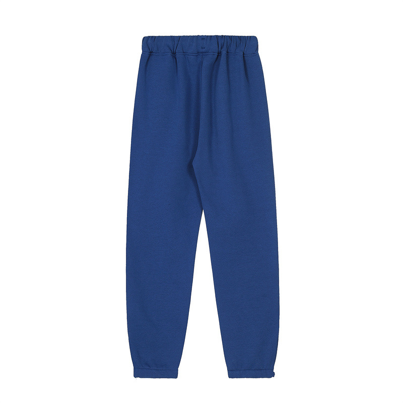 Marca de moda europea y americana Trapstar toalla azul y blanca bordada hombres y mujeres pareja pantalones casuales azules sueltos pantalones de chándal High Street