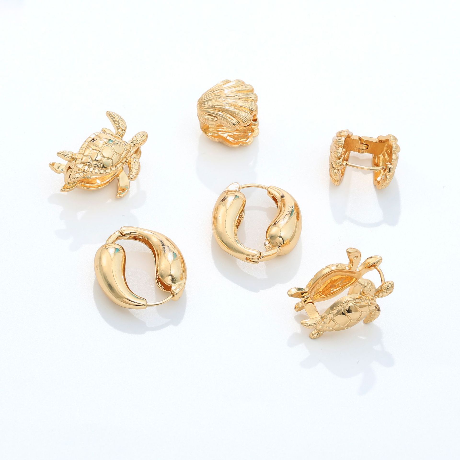 Estilo explosivo transfronterizo Serie oceánica de moda europea y americana Orejas de gota de agua Pendientes de sentido avanzado Pendientes geométricos