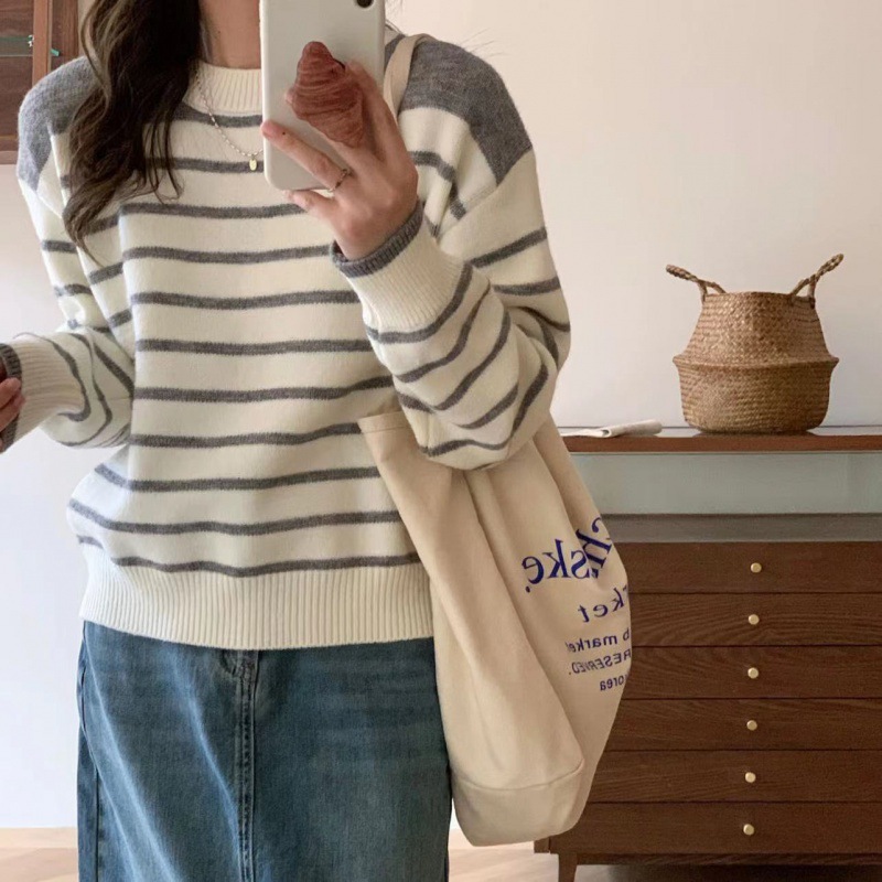 Otoño e Invierno a rayas ropa de abrigo suéter de las mujeres de diseño sentido nicho flojo perezoso estilo universitario edad-reducción espalda dividida suéter