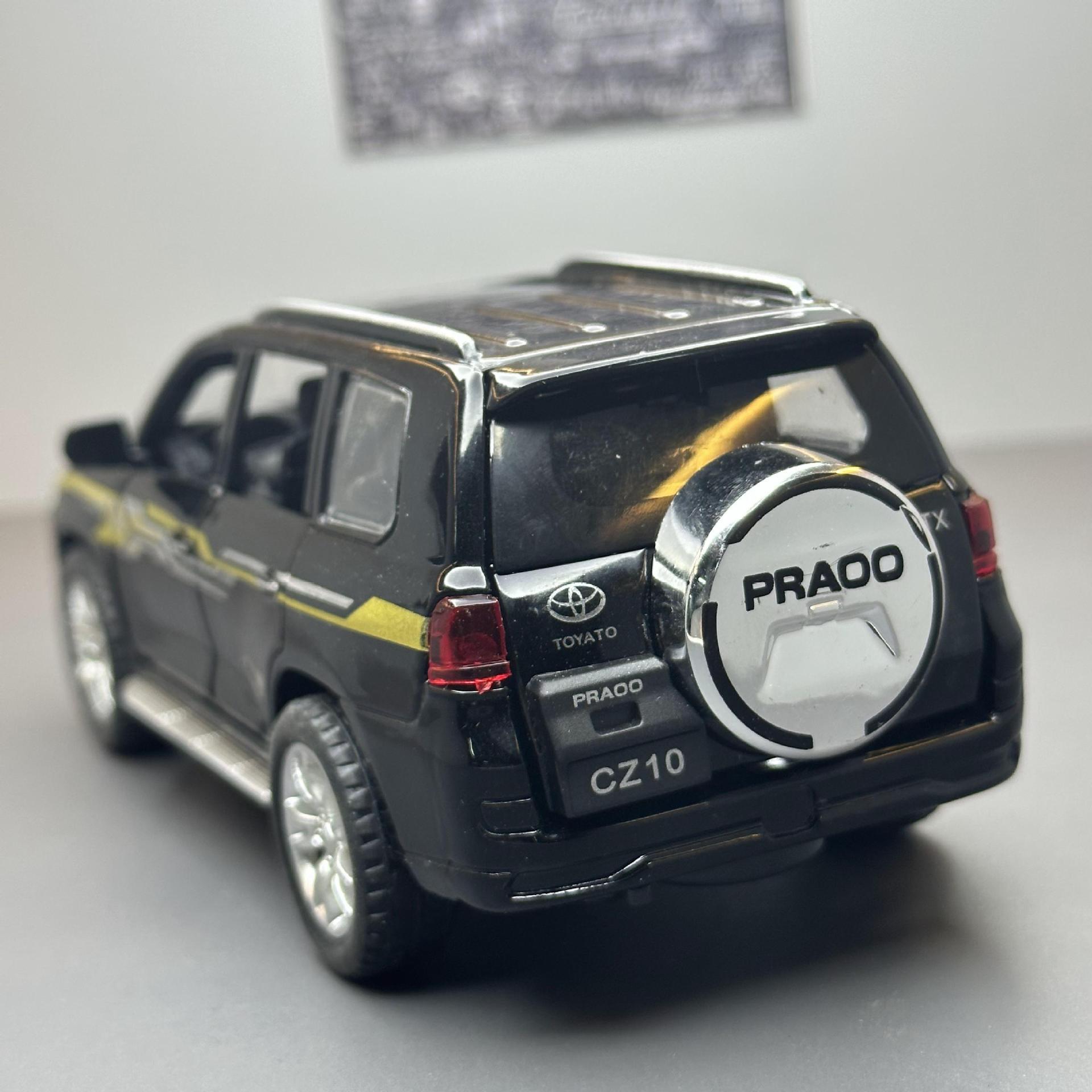 Modelo de coche de aleación de coche 1:32 Toyota Prado 2019 tire hacia atrás de sonido y luz de juguete todoterreno modelo de coche adornos