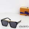 Black frame, gray lenses, gold logo