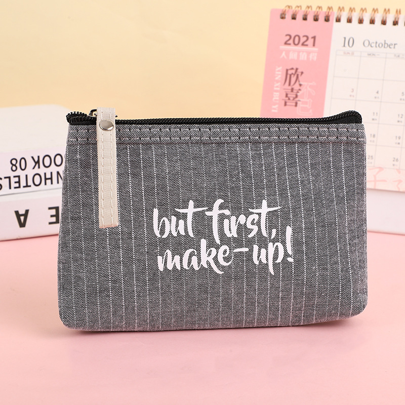 [Ventas directas de fábrica] diario simple carta bolsa de cosméticos portátil auricular bolsa de almacenamiento de monedas bolsa de viaje del estudiante