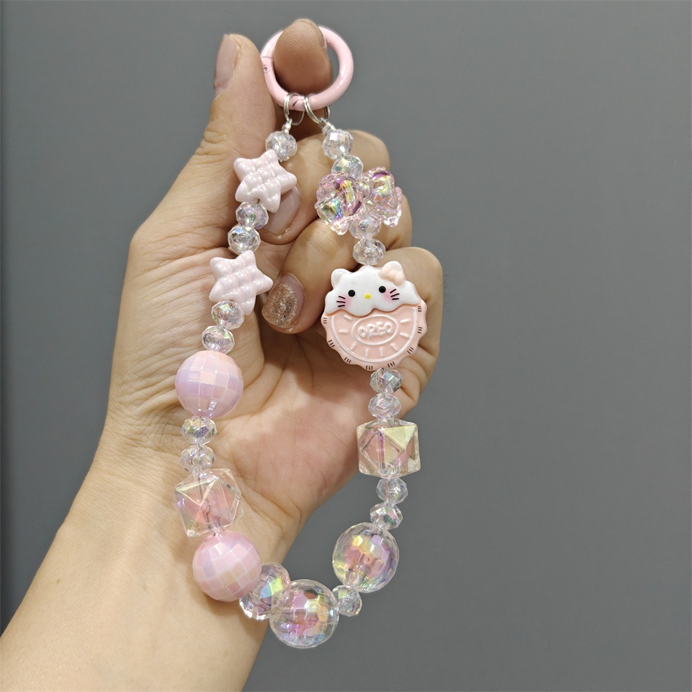 Dibujos animados Sanrio cadena de teléfono móvil bolsa de cuentas creativa cadena colgante muñeca colgante de llave de coche cadena de decoración de corazón de niña