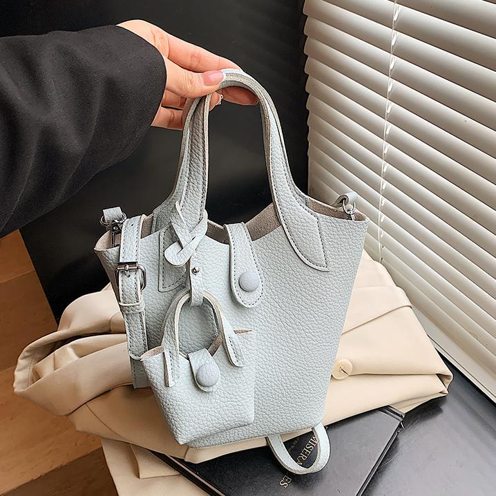 Tendencia de comercio exterior, bolsa de cubo de mano de nicho para mujer 2025 nuevo bolso de hombro casual de todo fósforo bolso de mensajero de moda de estilo occidental