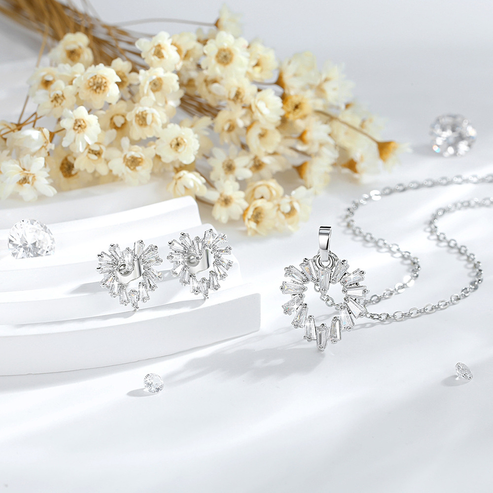 Europa y los Estados Unidos ins viento material de cobre hueco amor pendientes de zircón collar damas colgante conjunto de joyas transfronterizas