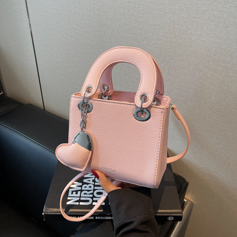 Bolso de mano de alta gama de comercio exterior para mujer 2025 nuevo bolso de hombro de todo fósforo de nicho de estilo occidental bolso de mensajero de moda