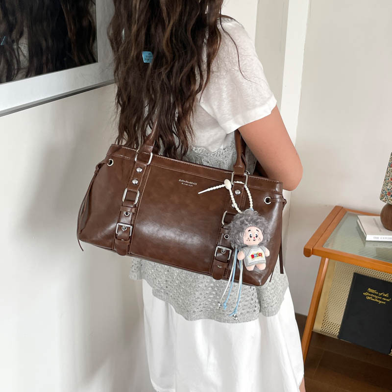 Bolsas de brazo coreanas lujosas retro 2026 verano nuevo estilo británico temperamento versátil bolsas de hombro de moda