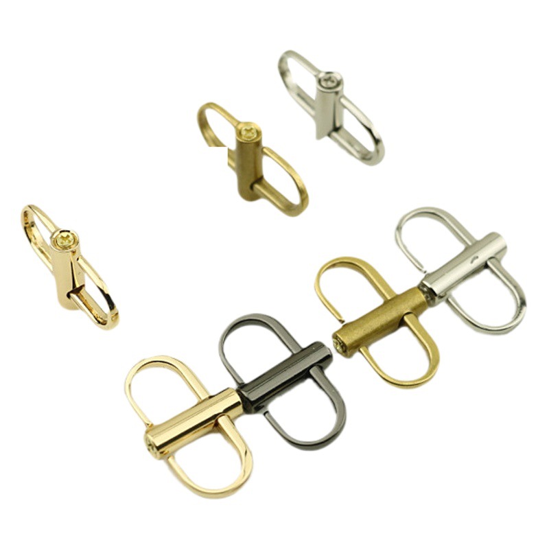 Venta al por mayor accesorios de hardware de cuero hebilla de ajuste de cadena fina de metal bolsa de posicionamiento de tornillo hebilla de ajuste de longitud de cadena