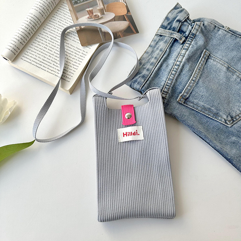 Primavera nuevo color sólido de punto de hombro mochila bolso móvil de moda versátil bolso de dopamina para hombres y mujeres