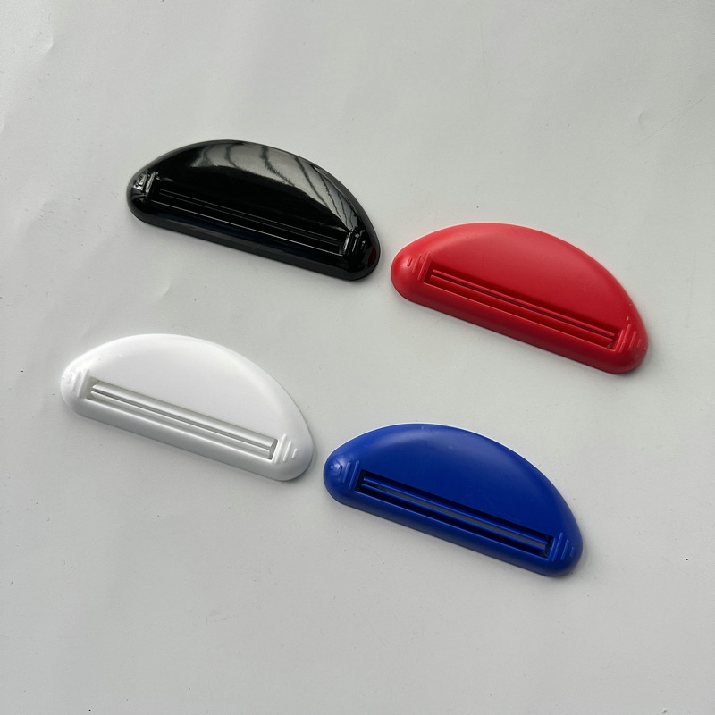 Grenzüberschreitender, versandfertiger manueller Quetscher, Spender für Gesichtsreiniger, Zahnpastaclip, kreatives Quetschwerkzeug_voghion.com