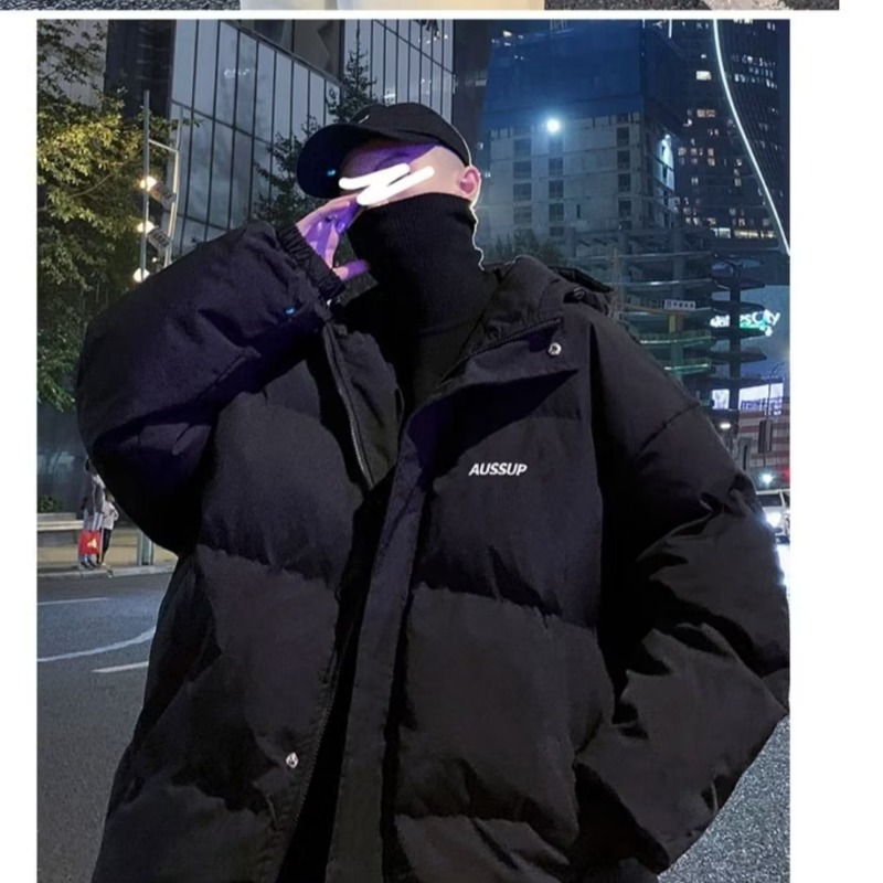 Abrigo de algodón acolchado con capucha de estilo de Hong Kong para hombres 2023 nuevo invierno engrosado abrigo de pan caliente abrigo negro suelto para hombres