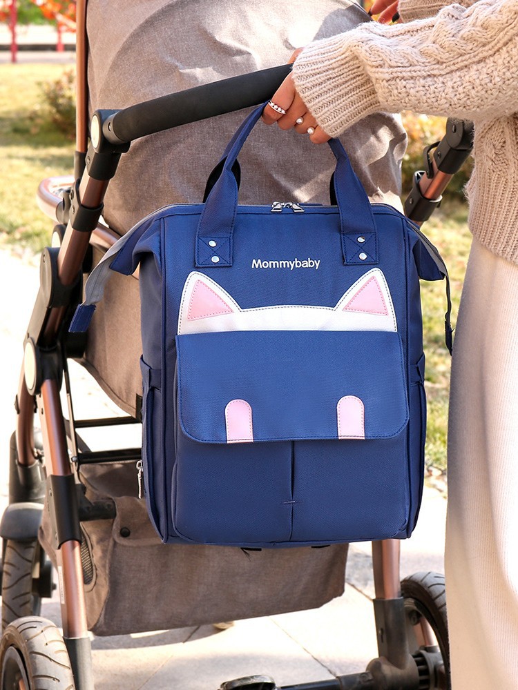 Estilo de gato transfronterizo de buena calidad, bolso de mamá de gran tamaño, mochila portátil, gran cantidad de stock, cremallera Oxford