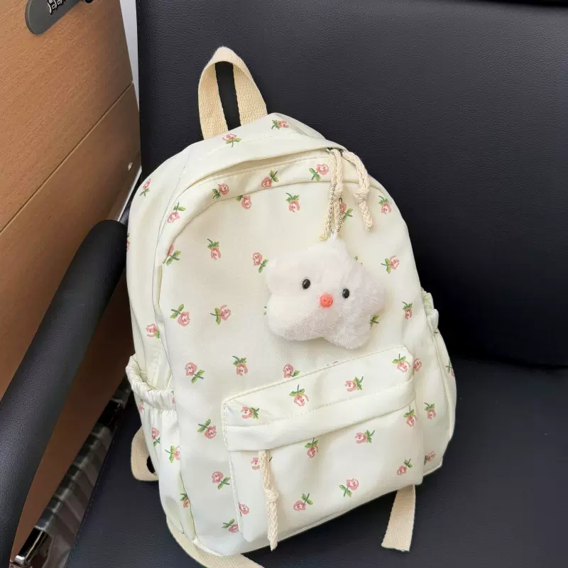 日系少女小碎花纯色简约旅行背包大容量轻便韩版印花学生双肩背包