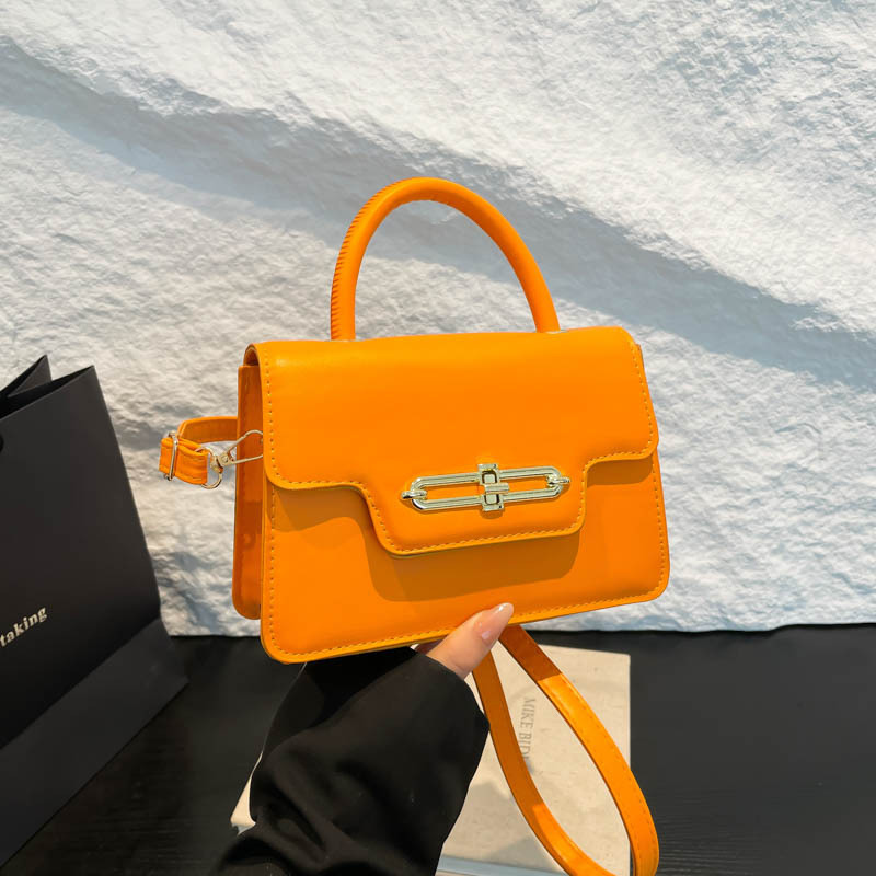 Bolso de hombro de gran capacidad retro 2025 primavera nuevo bloqueo de moda color caramelo empalme bolso de moda damas