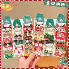 クリスマスの頭飾り子供の皮筋の女の子の漫画のサンタクロースの赤い髪ひもの女の子は髪ひもの髪飾りを傷つけません。