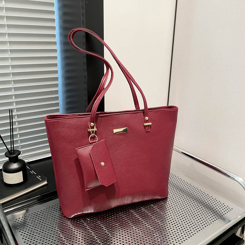 Simple paquete coreano de gran capacidad para niños y madres 2025 nuevo tipo de bolso para mujeres relajado sensación suave hombro bolso axilar