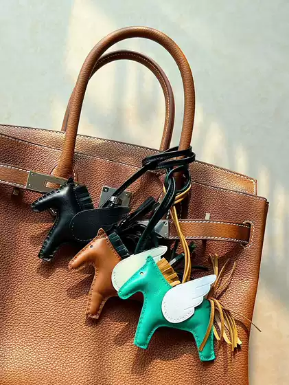 Genuine Leather Pony Charm Keychain Car Accessory - Small Flying Horse Bag Decoration with Tassel for Women