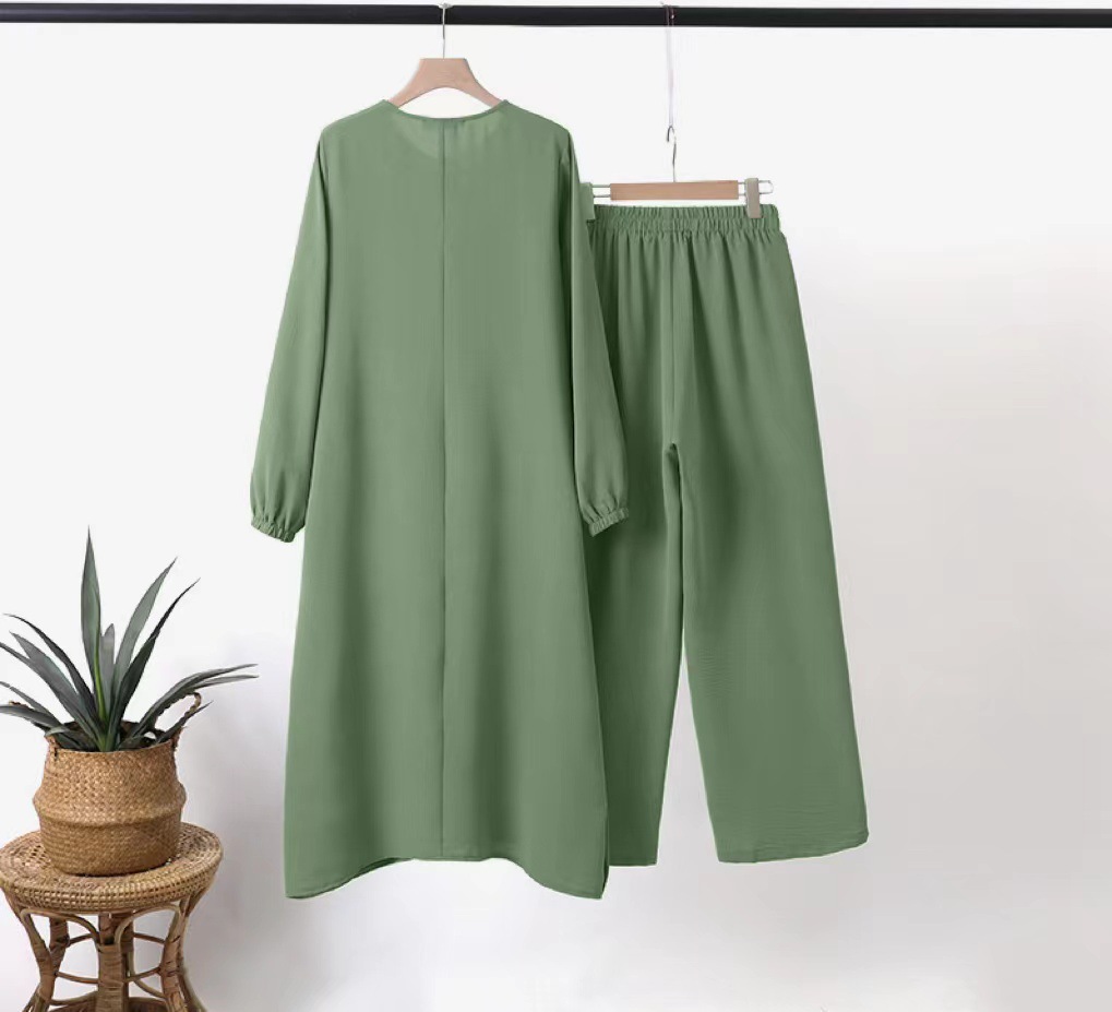 Abbigliamento donna 2024 nuova camicia a maniche a sbuffo con colletto rotondo da donna musulmana, cucitura laterale, bottone decorativo in legno, abito casual alla moda_voghion.com