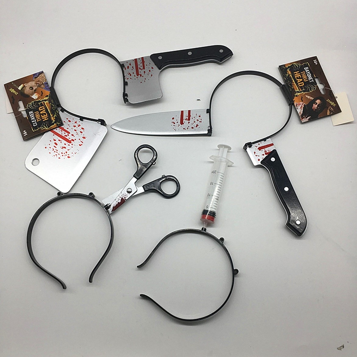 Halloween accesorios perforación cuchillo de colza de sangre anillo de cabello de terror fiesta decoración jeringa simulación de acabado de hacha anillo de hacha