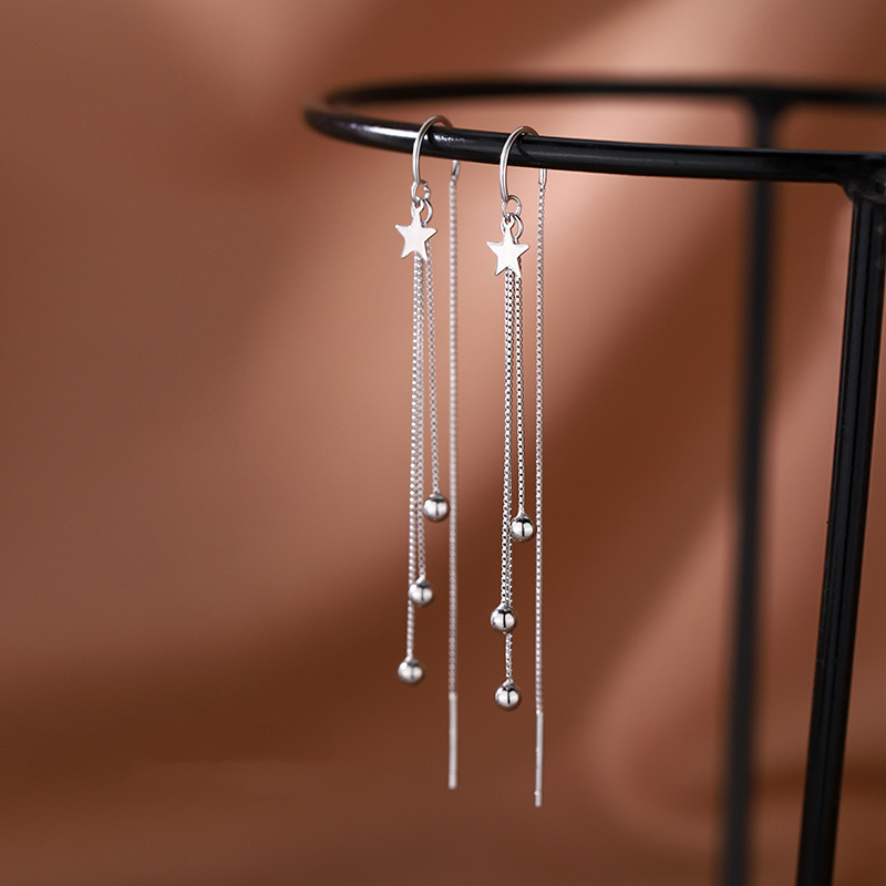 Pendientes largos con borla y estrella, estilo francés elegante y romántico, cuentas luminosas, diseño exagerado para mujer