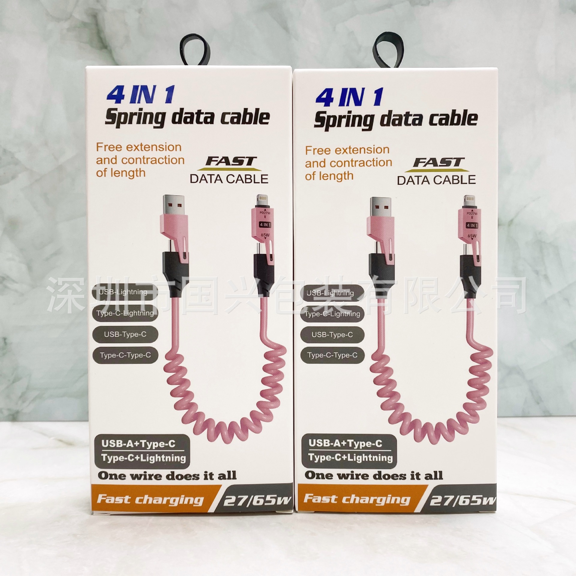 65W resorte telescópico cuatro en uno caja de embalaje de cable de datos neutro cable de datos cargado rápido un arrastre cuatro usb