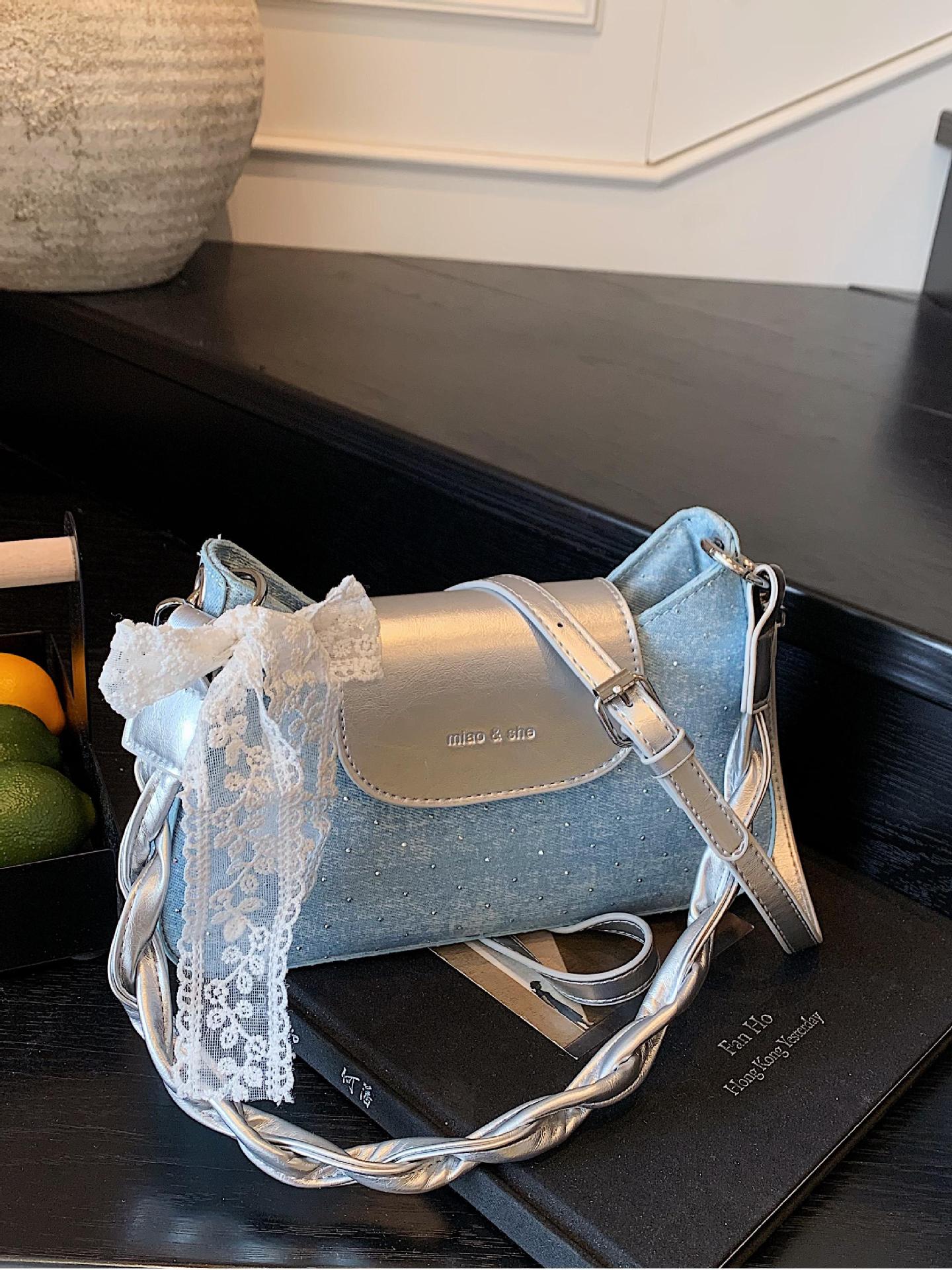 Bolso de moda coreano de estilo extranjero bolso de mano mujer 2025 verano nuevo bolso de brazo de denim bolso de viaje